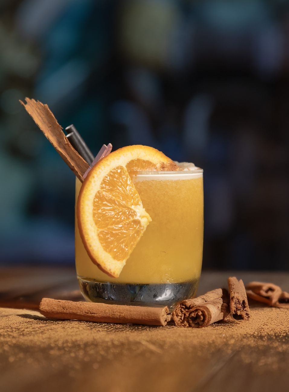 refreshing citrus cocktail with cinnamon garnish